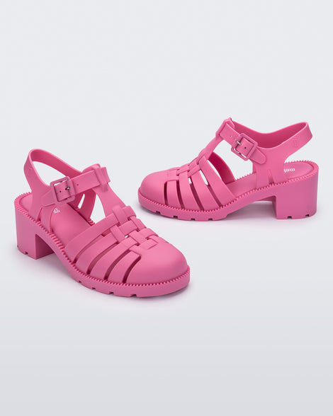 Angled view of a pair of pink Possession Heel women's fisherman style sandals.
