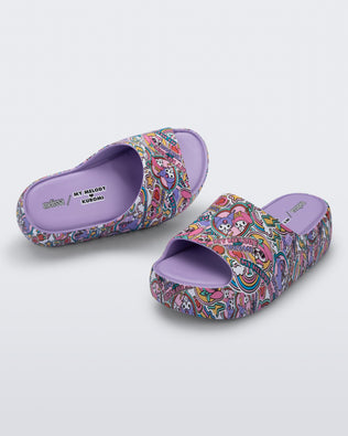 Top and angled view of a pair of purple Hello Kitty + Friends Free Platform with Hello Kitty and Friends print