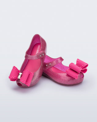 Product element, title Ultragirl Classic Bow in Glitter Pink
 price $69.00