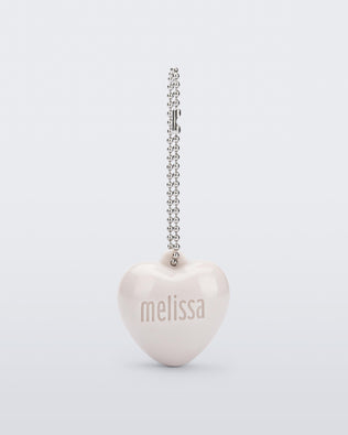 Front view of a beige Heart Charm