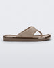 Side view of a beige Float flip flop