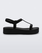 Side view of a black Sun Capri Platform sandal with ankle strap