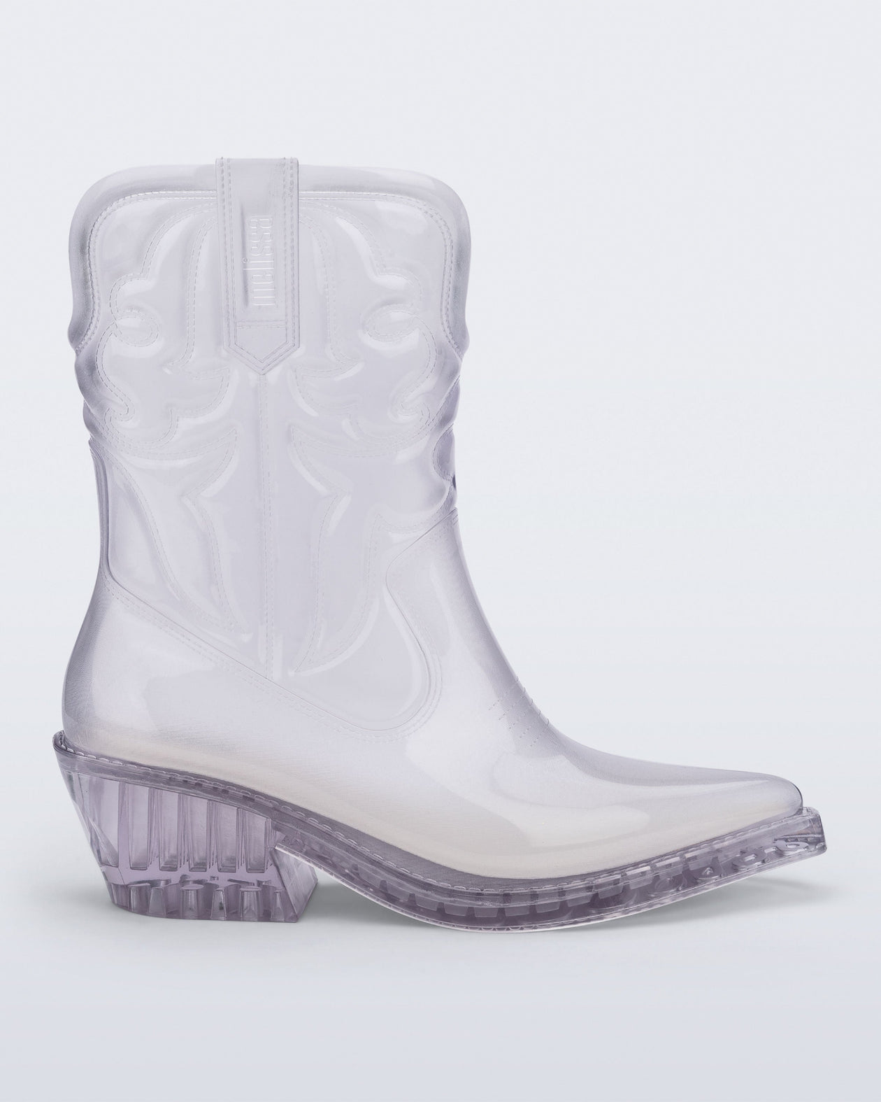 Side view of a clear Texas boot with pointed toe.