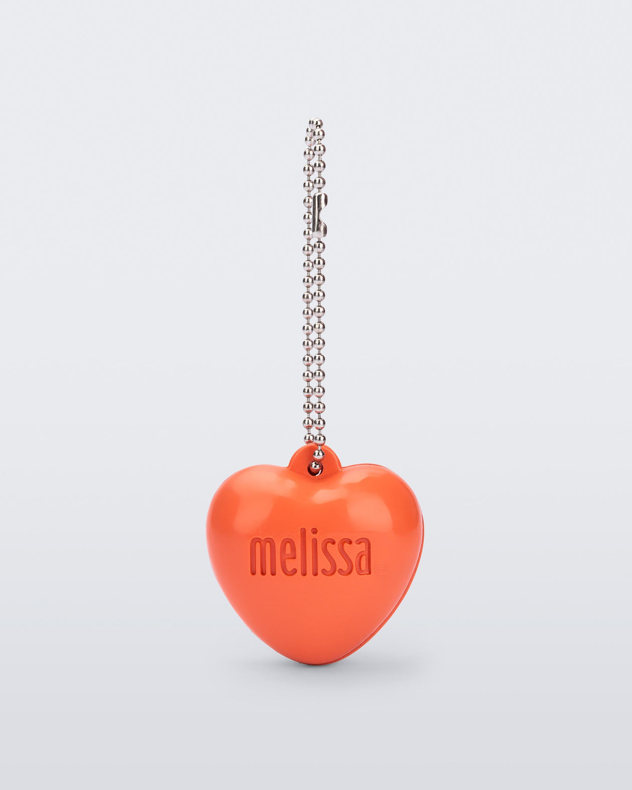Front view of an orange Heart Charm