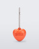 Front view of an orange Heart Charm