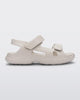 Side view of a beige Free Papete sandal