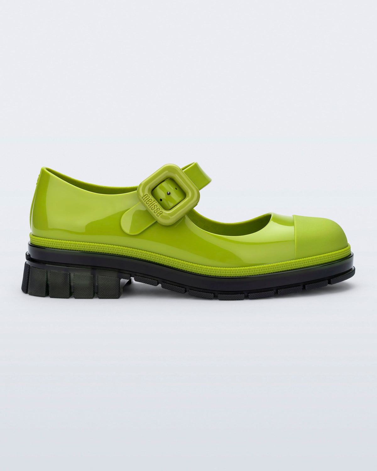 Side view of a green with black sole June mary jane with matte toe cap