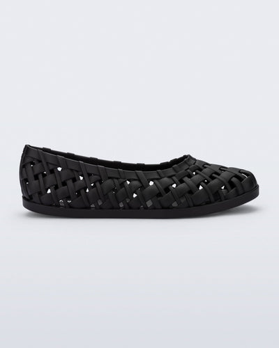 Side view of a black Possession Ballerina flat