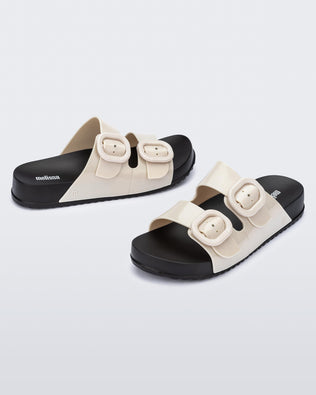 Product element, title Cozy in Black/Beige
 price $69.00