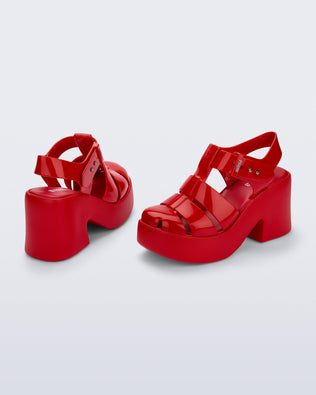 Back and side view of a pair of red Lulu platform heel fisherman sandals