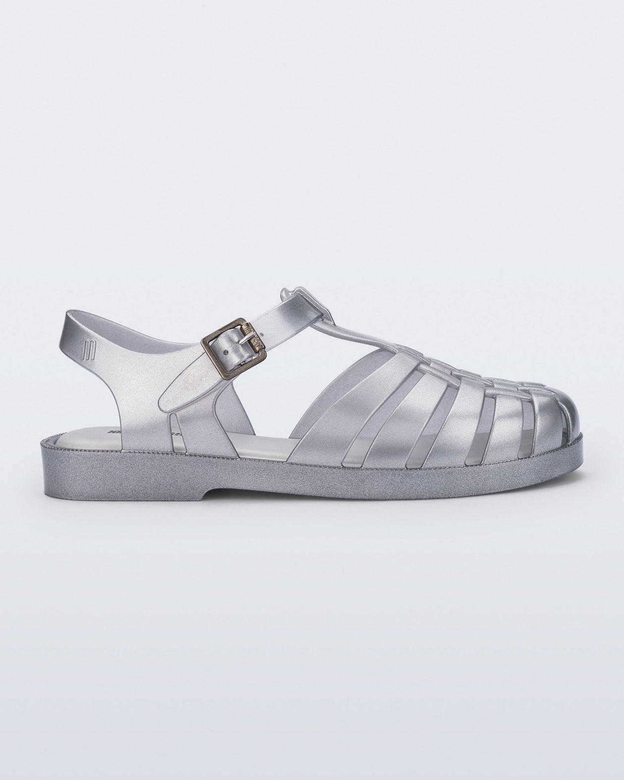 Side view of a magic silver Possession fisherman sandal