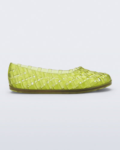 Side view of a clear green Possession Ballerina flat