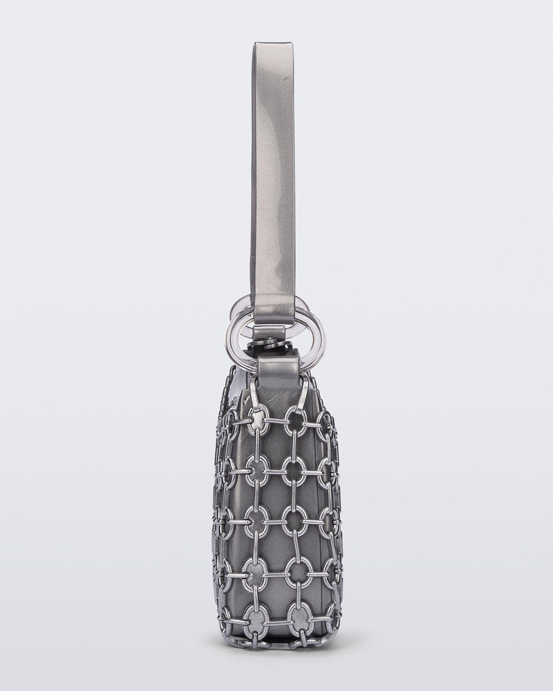 Side view of a silver Hoop bag with short shoulder strap