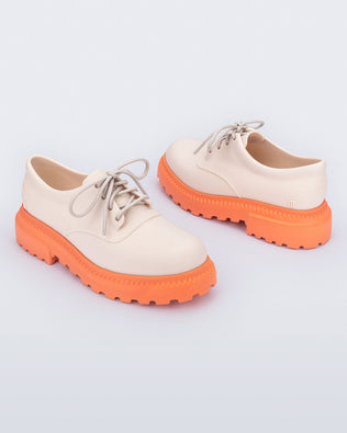 Product element, title Charlotte in Matte Beige/Orange
 price $76.30