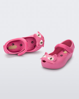 Top and angled view of a pair of pink Ultragirl Cat baby flats