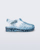 Side view of a blue Possession Elements baby sandal with glitter hearts