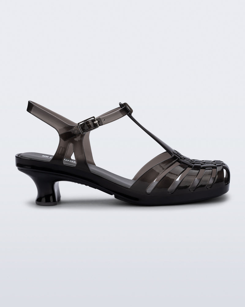 Side view of a clear black Vixen Kitten Heel sandal