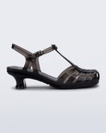 Side view of a clear black Vixen Kitten Heel sandal