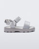 Side view of a silver baby Kick Off Sandal