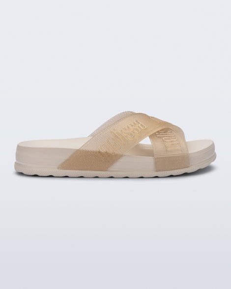 Side view of a beige Cozy M Lover Slide with Melissa on the upper