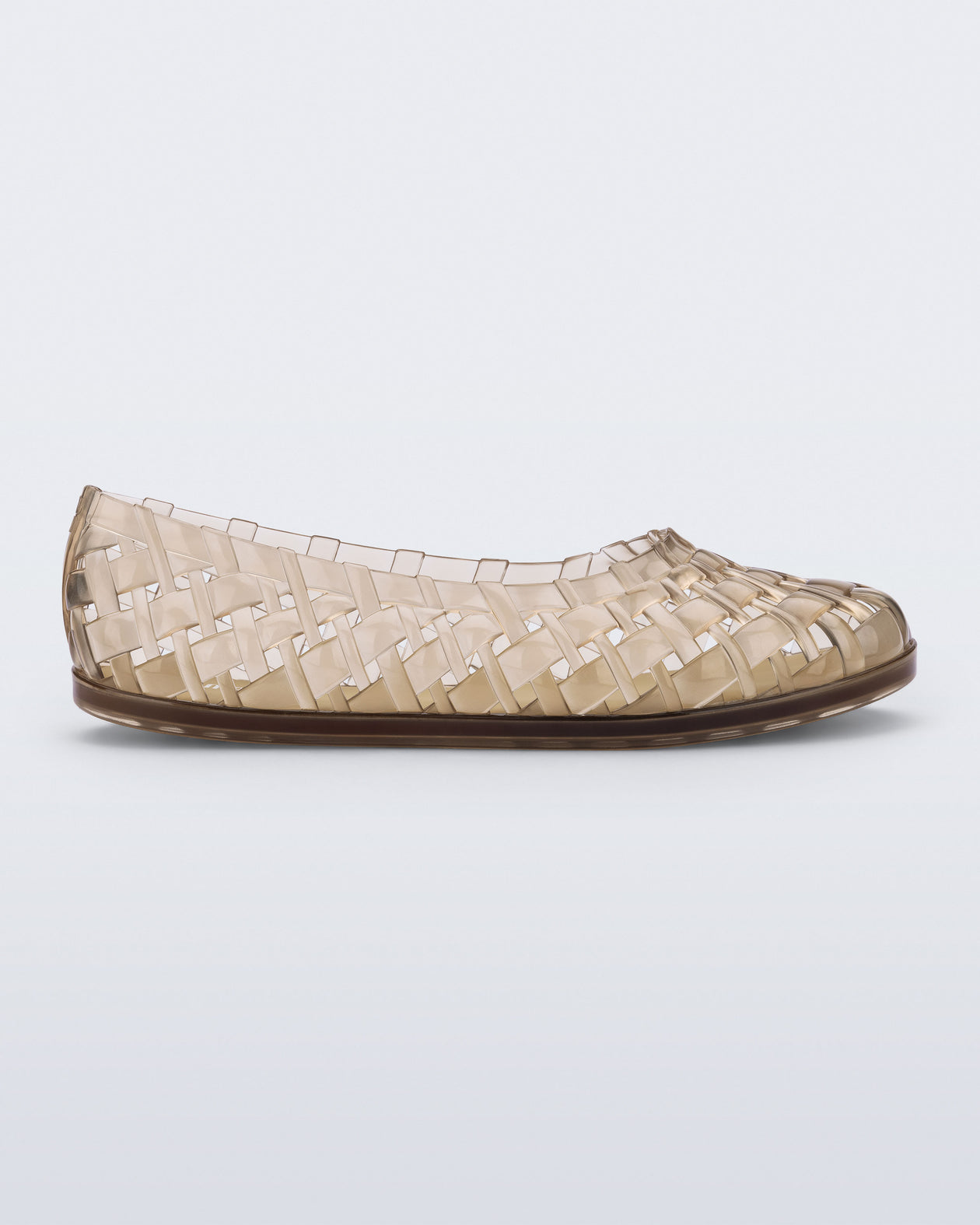 Side view of a beige Possession Ballerina flat
