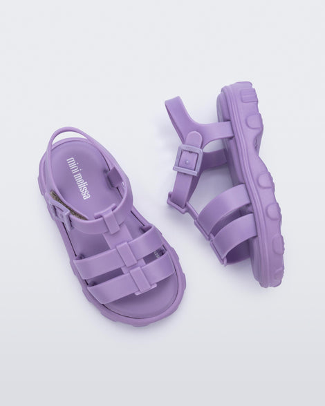 Side and top view of a pair of lilac Ella baby sandals