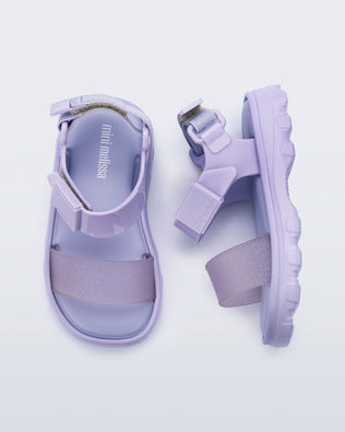 Top and side view of a pair of lilac baby Kick Off Sandals
