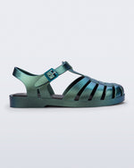 Side view of a metallic magic green Possession fisherman sandal