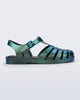 Side view of a metallic magic green Possession fisherman sandal