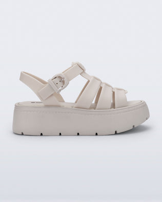 Side view of a light beige Up Platform sandal