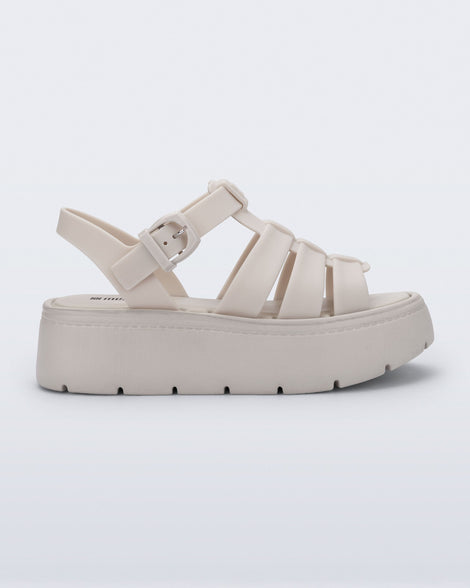 Side view of a light beige Up Platform sandal