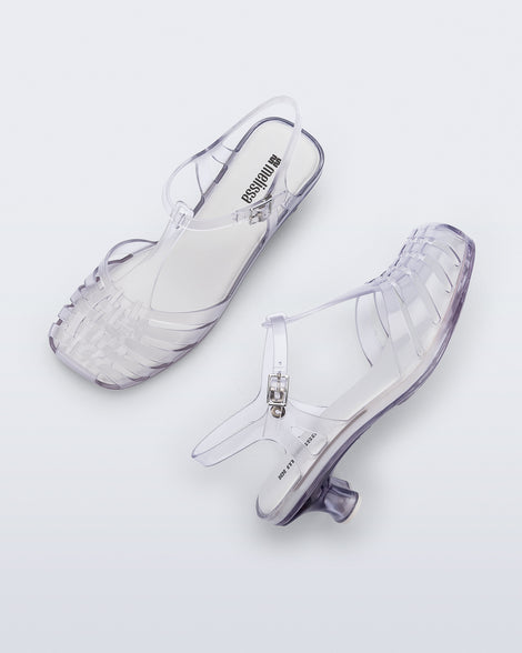 Top and side view of a pair of clear Vixen Kitten Heel sandals