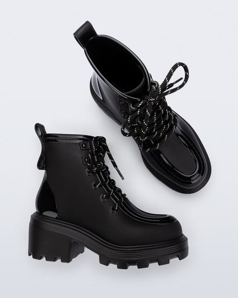 Top and side view of a pair of black Track Boot with small heel and black laces