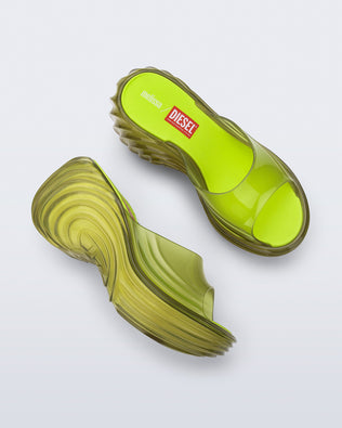 Side and top view of a pair of clear yellow Quantum Platform sandals