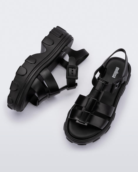Side and top view of a pair of black Ella women's platform sandals