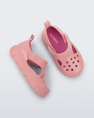 Top and side view of a pair of pink Bowie baby sandals.
