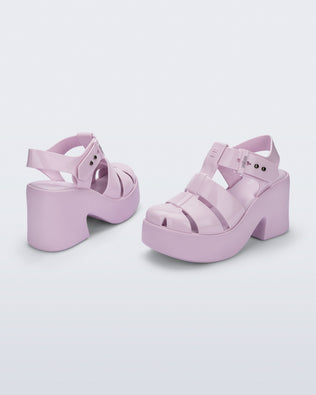 Back and side view of a pair of pink Lulu platform heel fisherman sandals