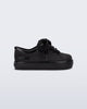 Side view of a black baby Hip Sneaker