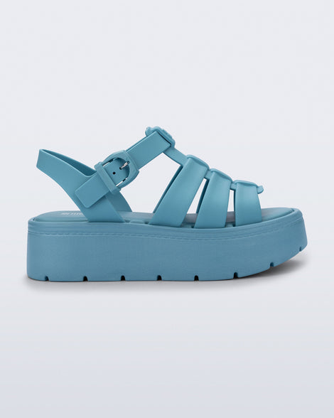 Side view of a blue Up Platform sandal