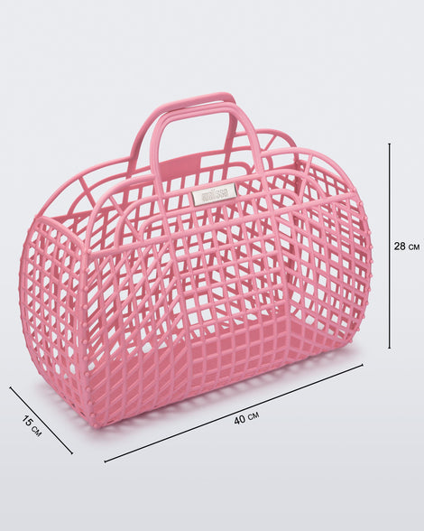 Angled view of a pink Refraction bag with handles with dimensions 40cm x 15cm x 28cm