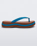 Side view of a brown/blue Melissa Leblon platform flip flop with details that mimic sisal braids on the sole and strap