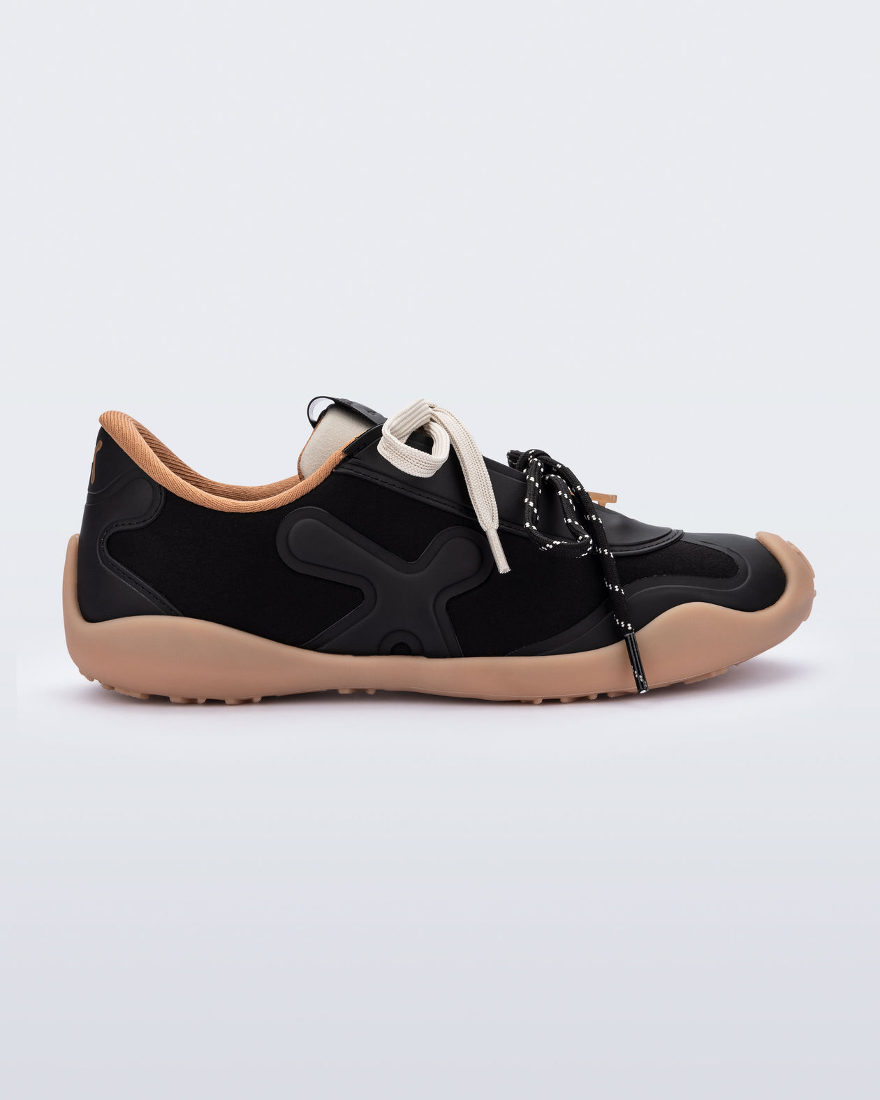 Side view of a black X Bend sneaker with beige sole