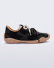 Side view of a black X Bend sneaker with beige sole
