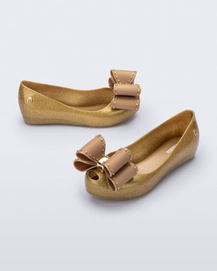 Product element, title Ultragirl Classic Bow in Pearly Beige
 price $69.00