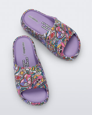 Top view of a pair of lilac Free Platform slides + Hello Kitty and Friends kids sandals with Hello Kitty and Friends print