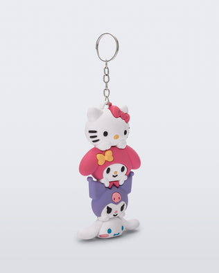 Angled view of a Hello Kitty + Friends charm keychain with Hello Kitty and two friends