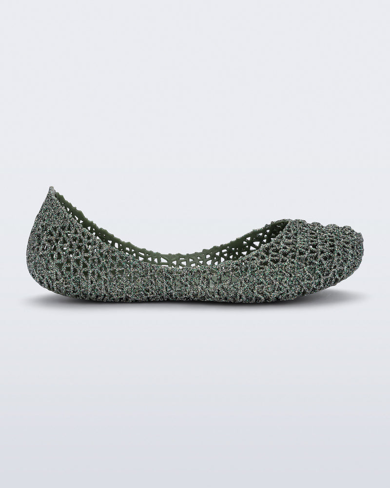 Side view of a  glitter green Campana kids flat