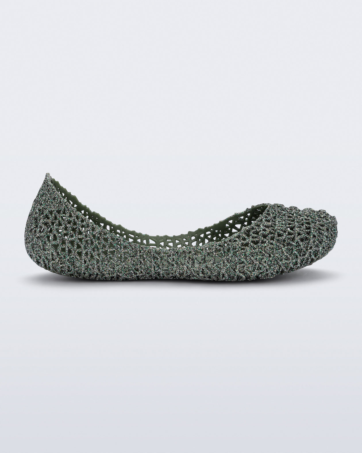 Side view of a  glitter green Campana kids flat