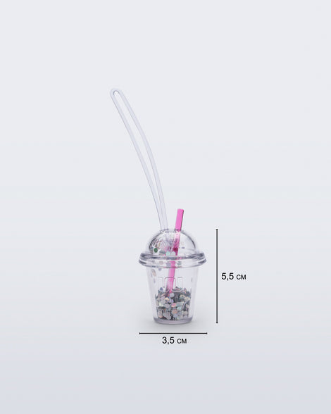 Front view of a clear drink charm with pink straw with measurements 3.5cm x 5.5cm