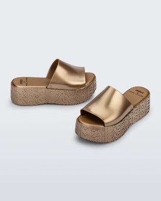 Product element, title Becky in Gold
 price $195.00